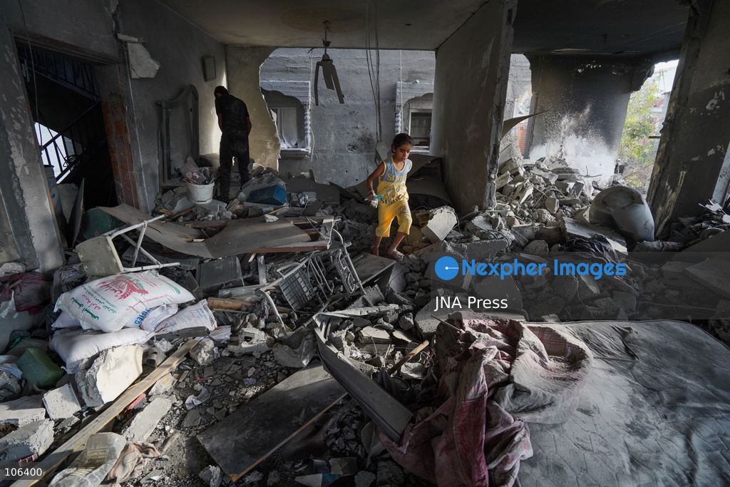 MAGHAZI REFUGEE CAMP, GAZA STRIP, PALESTINE, [MONTH DAY, YEAR]: Destruction following Israeli airstrikes that hit homes belonging to the Saada and Abu Muaileq families in Maghazi refugee camp in the central Gaza Strip. The strikes on October 15 destroyed both homes and caused extensive damage to surrounding residential buildings. Photo by Ramzi Abu AMER/ JNA Press. (Photo by Ramzi Abu Amer/JNA Press via Nexpher Images)
