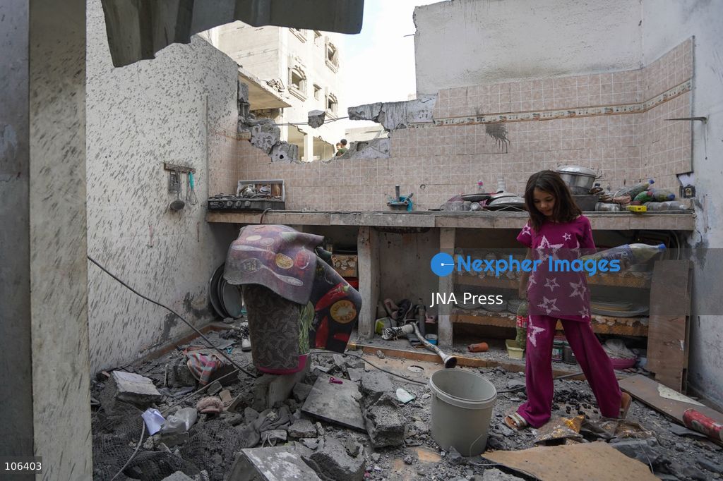 MAGHAZI REFUGEE CAMP, GAZA STRIP, PALESTINE, [MONTH DAY, YEAR]: Destruction following Israeli airstrikes that hit homes belonging to the Saada and Abu Muaileq families in Maghazi refugee camp in the central Gaza Strip. The strikes on October 15 destroyed both homes and caused extensive damage to surrounding residential buildings. Photo by Ramzi Abu AMER/ JNA Press. (Photo by Ramzi Abu Amer/JNA Press via Nexpher Images)