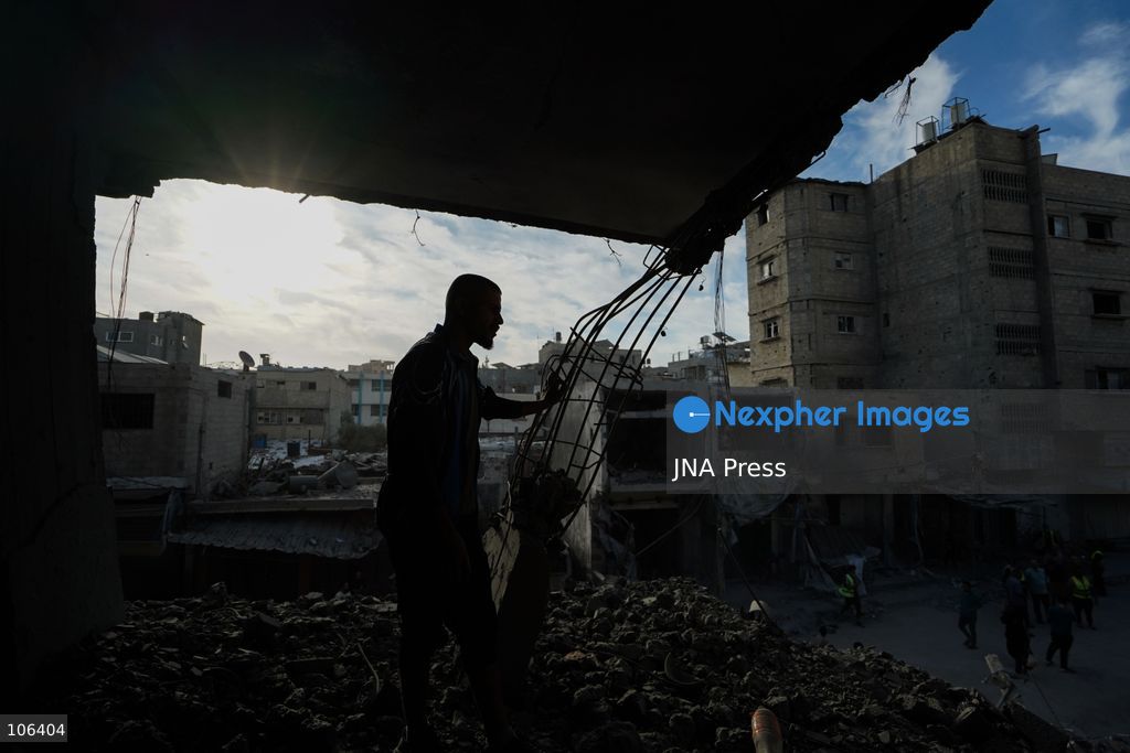 MAGHAZI REFUGEE CAMP, GAZA STRIP, PALESTINE, [MONTH DAY, YEAR]: Destruction following Israeli airstrikes that hit homes belonging to the Saada and Abu Muaileq families in Maghazi refugee camp in the central Gaza Strip. The strikes on October 15 destroyed both homes and caused extensive damage to surrounding residential buildings. Photo by Ramzi Abu AMER/ JNA Press. (Photo by Ramzi Abu Amer/JNA Press via Nexpher Images)