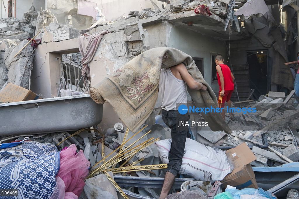 MAGHAZI REFUGEE CAMP, GAZA STRIP, PALESTINE, [MONTH DAY, YEAR]: Destruction following Israeli airstrikes that hit homes belonging to the Saada and Abu Muaileq families in Maghazi refugee camp in the central Gaza Strip. The strikes on October 15 destroyed both homes and caused extensive damage to surrounding residential buildings. Photo by Ramzi Abu AMER/ JNA Press. (Photo by Ramzi Abu Amer/JNA Press via Nexpher Images)