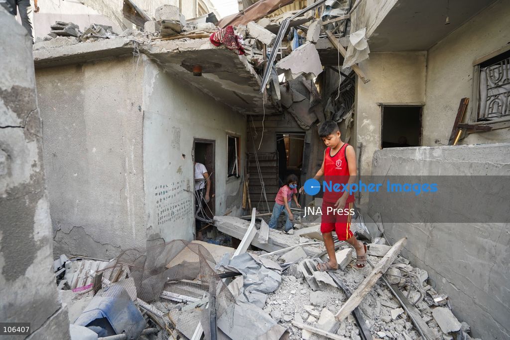 MAGHAZI REFUGEE CAMP, GAZA STRIP, PALESTINE, [MONTH DAY, YEAR]: Destruction following Israeli airstrikes that hit homes belonging to the Saada and Abu Muaileq families in Maghazi refugee camp in the central Gaza Strip. The strikes on October 15 destroyed both homes and caused extensive damage to surrounding residential buildings. Photo by Ramzi Abu AMER/ JNA Press. (Photo by Ramzi Abu Amer/JNA Press via Nexpher Images)