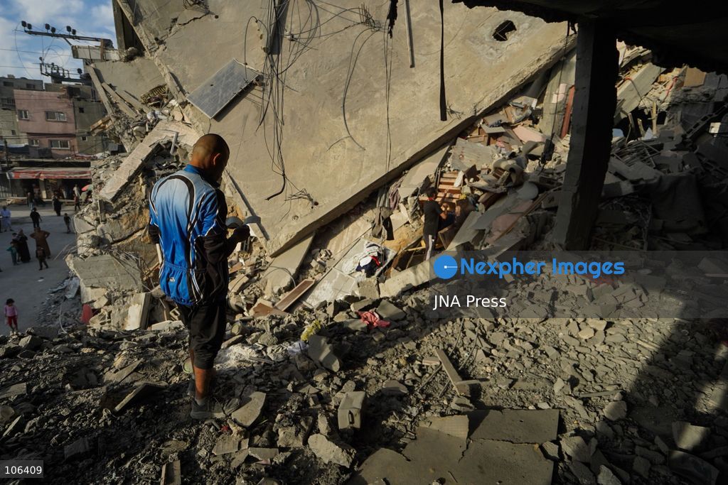 MAGHAZI REFUGEE CAMP, GAZA STRIP, PALESTINE, [MONTH DAY, YEAR]: Destruction following Israeli airstrikes that hit homes belonging to the Saada and Abu Muaileq families in Maghazi refugee camp in the central Gaza Strip. The strikes on October 15 destroyed both homes and caused extensive damage to surrounding residential buildings. Photo by Ramzi Abu AMER/ JNA Press. (Photo by Ramzi Abu Amer/JNA Press via Nexpher Images)