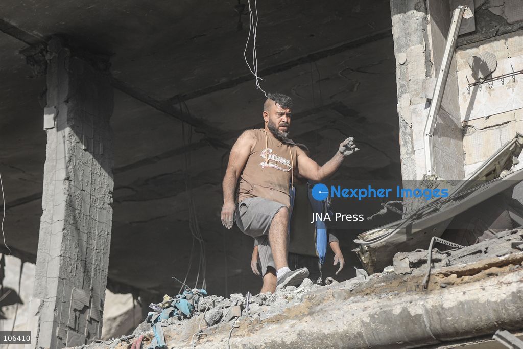 MAGHAZI REFUGEE CAMP, GAZA STRIP, PALESTINE, [MONTH DAY, YEAR]: Destruction following Israeli airstrikes that hit homes belonging to the Saada and Abu Muaileq families in Maghazi refugee camp in the central Gaza Strip. The strikes on October 15 destroyed both homes and caused extensive damage to surrounding residential buildings. Photo by Ramzi Abu AMER/ JNA Press. (Photo by Ramzi Abu Amer/JNA Press via Nexpher Images)
