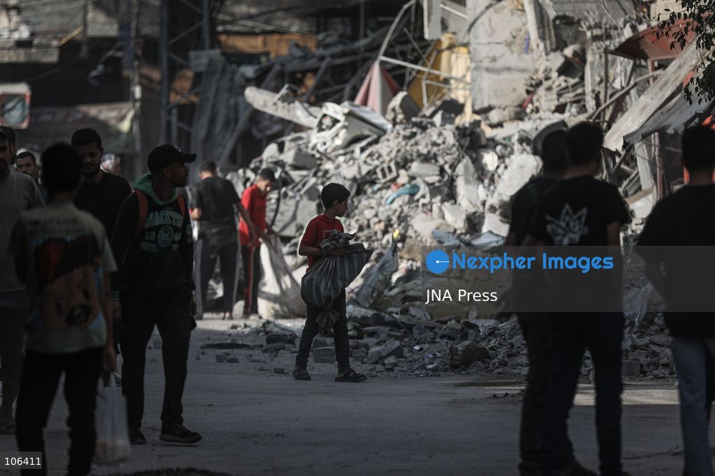 MAGHAZI REFUGEE CAMP, GAZA STRIP, PALESTINE, [MONTH DAY, YEAR]: Destruction following Israeli airstrikes that hit homes belonging to the Saada and Abu Muaileq families in Maghazi refugee camp in the central Gaza Strip. The strikes on October 15 destroyed both homes and caused extensive damage to surrounding residential buildings. Photo by Ramzi Abu AMER/ JNA Press. (Photo by Ramzi Abu Amer/JNA Press via Nexpher Images)