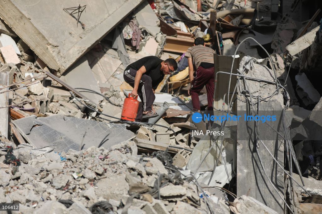 MAGHAZI REFUGEE CAMP, GAZA STRIP, PALESTINE, [MONTH DAY, YEAR]: Destruction following Israeli airstrikes that hit homes belonging to the Saada and Abu Muaileq families in Maghazi refugee camp in the central Gaza Strip. The strikes on October 15 destroyed both homes and caused extensive damage to surrounding residential buildings. Photo by Ramzi Abu AMER/ JNA Press. (Photo by Ramzi Abu Amer/JNA Press via Nexpher Images)