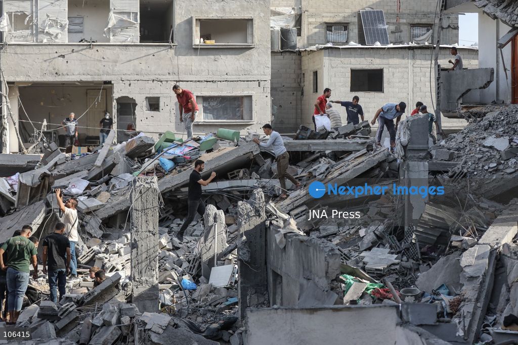 MAGHAZI REFUGEE CAMP, GAZA STRIP, PALESTINE, [MONTH DAY, YEAR]: Destruction following Israeli airstrikes that hit homes belonging to the Saada and Abu Muaileq families in Maghazi refugee camp in the central Gaza Strip. The strikes on October 15 destroyed both homes and caused extensive damage to surrounding residential buildings. Photo by Ramzi Abu AMER/ JNA Press. (Photo by Ramzi Abu Amer/JNA Press via Nexpher Images)