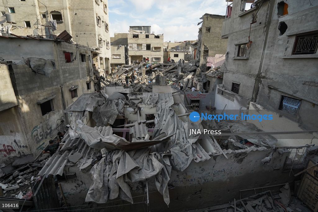 MAGHAZI REFUGEE CAMP, GAZA STRIP, PALESTINE, [MONTH DAY, YEAR]: Destruction following Israeli airstrikes that hit homes belonging to the Saada and Abu Muaileq families in Maghazi refugee camp in the central Gaza Strip. The strikes on October 15 destroyed both homes and caused extensive damage to surrounding residential buildings. Photo by Ramzi Abu AMER/ JNA Press. (Photo by Ramzi Abu Amer/JNA Press via Nexpher Images)