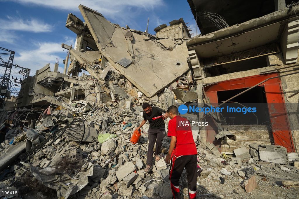 MAGHAZI REFUGEE CAMP, GAZA STRIP, PALESTINE, [MONTH DAY, YEAR]: Destruction following Israeli airstrikes that hit homes belonging to the Saada and Abu Muaileq families in Maghazi refugee camp in the central Gaza Strip. The strikes on October 15 destroyed both homes and caused extensive damage to surrounding residential buildings. Photo by Ramzi Abu AMER/ JNA Press. (Photo by Ramzi Abu Amer/JNA Press via Nexpher Images)
