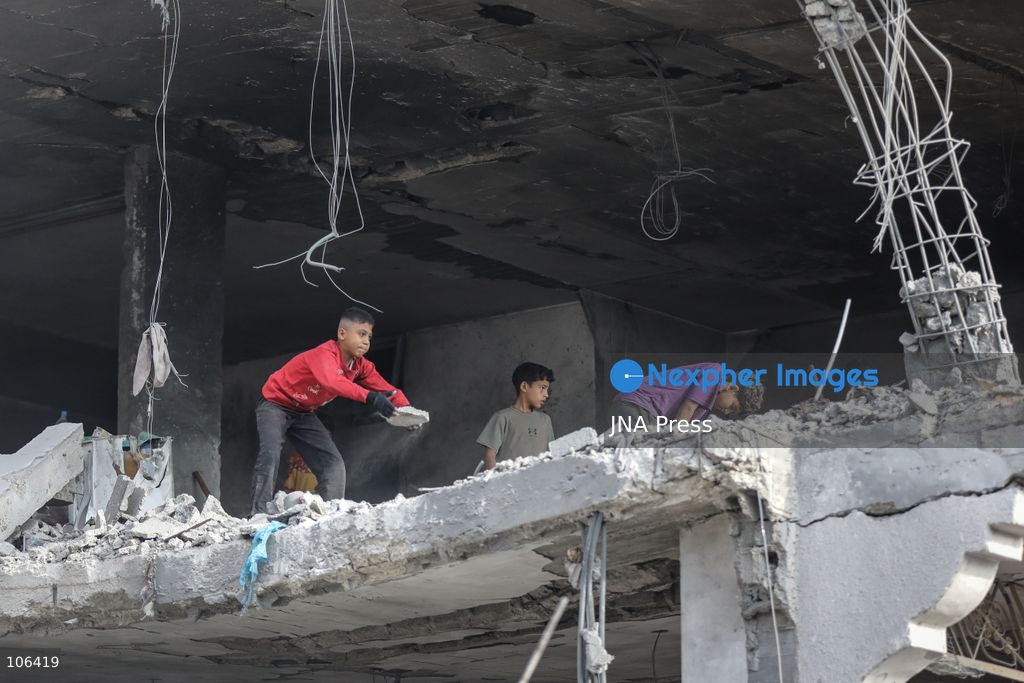 MAGHAZI REFUGEE CAMP, GAZA STRIP, PALESTINE, [MONTH DAY, YEAR]: Destruction following Israeli airstrikes that hit homes belonging to the Saada and Abu Muaileq families in Maghazi refugee camp in the central Gaza Strip. The strikes on October 15 destroyed both homes and caused extensive damage to surrounding residential buildings. Photo by Ramzi Abu AMER/ JNA Press. (Photo by Ramzi Abu Amer/JNA Press via Nexpher Images)