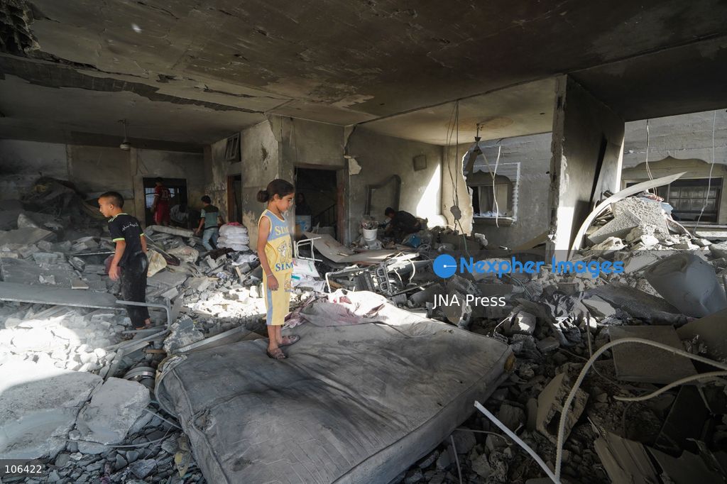 MAGHAZI REFUGEE CAMP, GAZA STRIP, PALESTINE, [MONTH DAY, YEAR]: Destruction following Israeli airstrikes that hit homes belonging to the Saada and Abu Muaileq families in Maghazi refugee camp in the central Gaza Strip. The strikes on October 15 destroyed both homes and caused extensive damage to surrounding residential buildings. Photo by Ramzi Abu AMER/ JNA Press. (Photo by Ramzi Abu Amer/JNA Press via Nexpher Images)