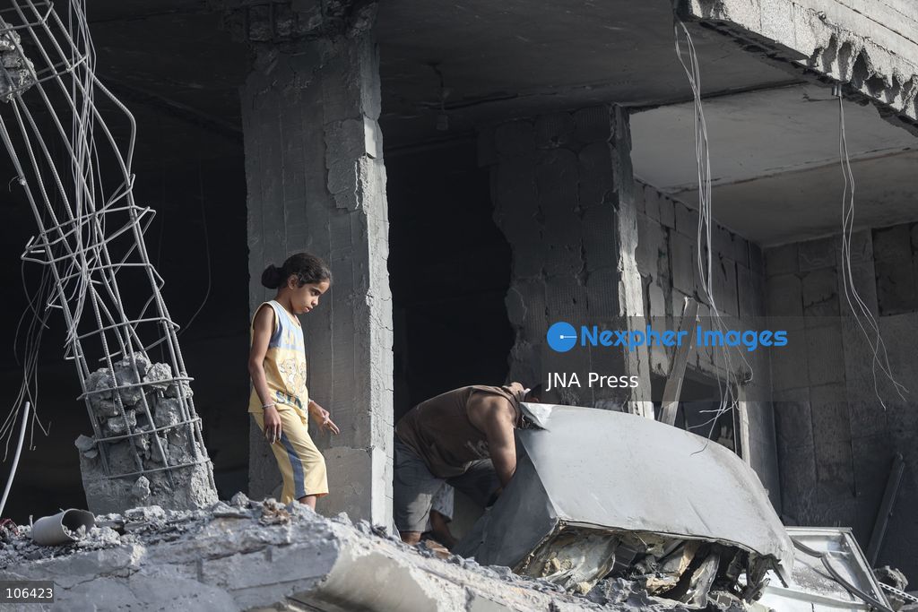 MAGHAZI REFUGEE CAMP, GAZA STRIP, PALESTINE, [MONTH DAY, YEAR]: Destruction following Israeli airstrikes that hit homes belonging to the Saada and Abu Muaileq families in Maghazi refugee camp in the central Gaza Strip. The strikes on October 15 destroyed both homes and caused extensive damage to surrounding residential buildings. Photo by Ramzi Abu AMER/ JNA Press. (Photo by Ramzi Abu Amer/JNA Press via Nexpher Images)