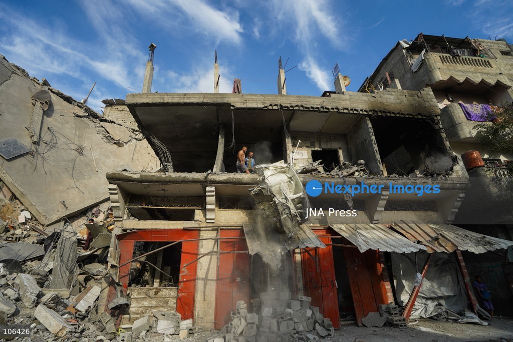 MAGHAZI REFUGEE CAMP, GAZA STRIP, PALESTINE, [MONTH DAY, YEAR]: Destruction following Israeli airstrikes that hit homes belonging to the Saada and Abu Muaileq families in Maghazi refugee camp in the central Gaza Strip. The strikes on October 15 destroyed both homes and caused extensive damage to surrounding residential buildings. Photo by Ramzi Abu AMER/ JNA Press. (Photo by Ramzi Abu Amer/JNA Press via Nexpher Images)