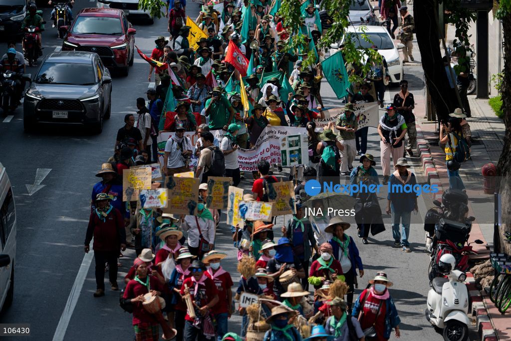 BANGKOK, THAILAND, OCTOBER 16, 2026: Members of Thailand’s Assembly of the Poor and allied community networks demonstrate during the annual meetings of the International Monetary Fund (IMF) and the World Bank Group. Protesters march towards the Queen Sirikit National Convention Center, calling for debt relief, greater public oversight of government borrowing and more public participation in economic policymaking. Photo by Captain Jirathummanuwat / JNA Press. (Photo by Captain Jirathummanuwat/JNA Press via Nexpher Images)