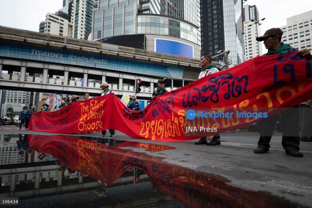 BANGKOK, THAILAND, OCTOBER 16, 2026: Members of Thailand’s Assembly of the Poor and allied community networks demonstrate during the annual meetings of the International Monetary Fund (IMF) and the World Bank Group. Protesters march towards the Queen Sirikit National Convention Center, calling for debt relief, greater public oversight of government borrowing and more public participation in economic policymaking. Photo by Captain Jirathummanuwat / JNA Press. (Photo by Captain Jirathummanuwat/JNA Press via Nexpher Images)