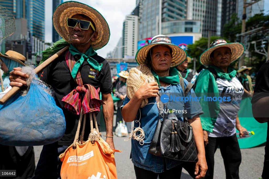 BANGKOK, THAILAND, OCTOBER 16, 2026: Members of Thailand’s Assembly of the Poor and allied community networks demonstrate during the annual meetings of the International Monetary Fund (IMF) and the World Bank Group. Protesters march towards the Queen Sirikit National Convention Center, calling for debt relief, greater public oversight of government borrowing and more public participation in economic policymaking. Photo by Captain Jirathummanuwat / JNA Press. (Photo by Captain Jirathummanuwat/JNA Press via Nexpher Images)