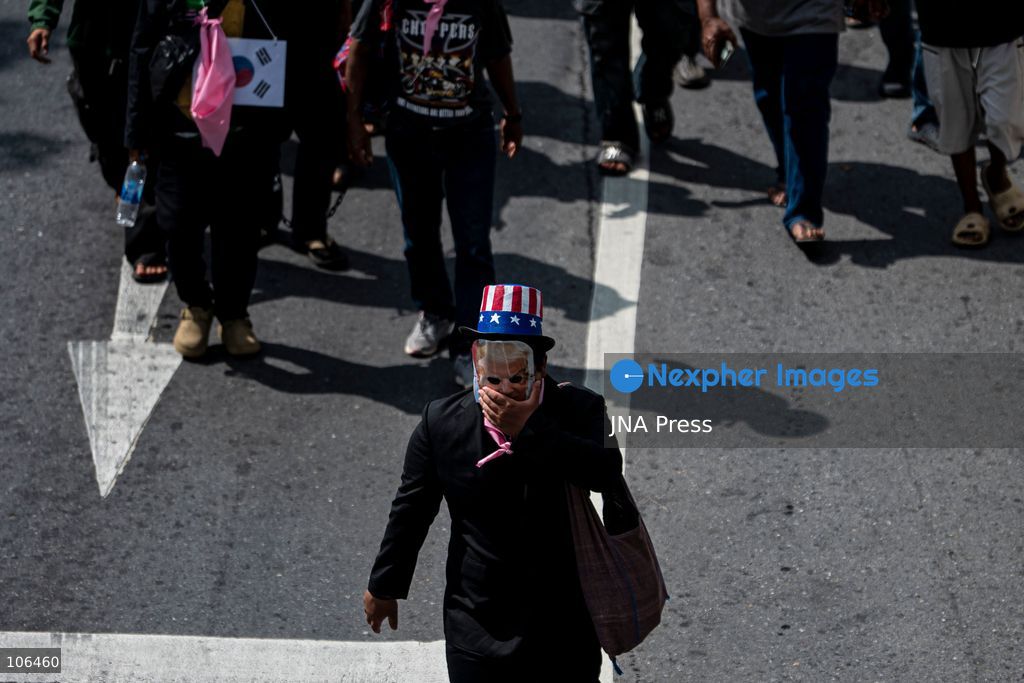 BANGKOK, THAILAND, OCTOBER 16, 2026: Members of Thailand’s Assembly of the Poor and allied community networks demonstrate during the annual meetings of the International Monetary Fund (IMF) and the World Bank Group. Protesters march towards the Queen Sirikit National Convention Center, calling for debt relief, greater public oversight of government borrowing and more public participation in economic policymaking. Photo by Captain Jirathummanuwat / JNA Press. (Photo by Captain Jirathummanuwat/JNA Press via Nexpher Images)