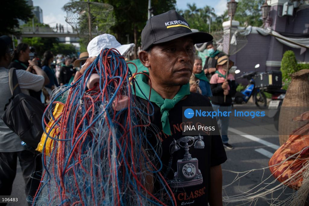 BANGKOK, THAILAND, OCTOBER 16, 2026: Members of the Assembly of the Poor and allied networks march towards the Queen Sirikit National Convention Center during the annual meetings of the International Monetary Fund (IMF) and the World Bank Group. Demonstrators call for debt relief, food sovereignty and greater public participation in economic policymaking. Photo by Panawat Seangsotg / JNA Press. (Photo by Panawat Seangsotg/JNA Press via Nexpher Images)