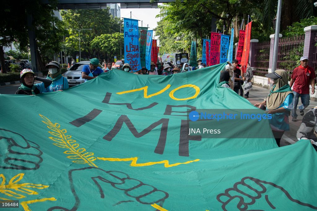 BANGKOK, THAILAND, OCTOBER 16, 2026: Members of the Assembly of the Poor and allied networks march towards the Queen Sirikit National Convention Center during the annual meetings of the International Monetary Fund (IMF) and the World Bank Group. Demonstrators call for debt relief, food sovereignty and greater public participation in economic policymaking. Photo by Panawat Seangsotg / JNA Press. (Photo by Panawat Seangsotg/JNA Press via Nexpher Images)