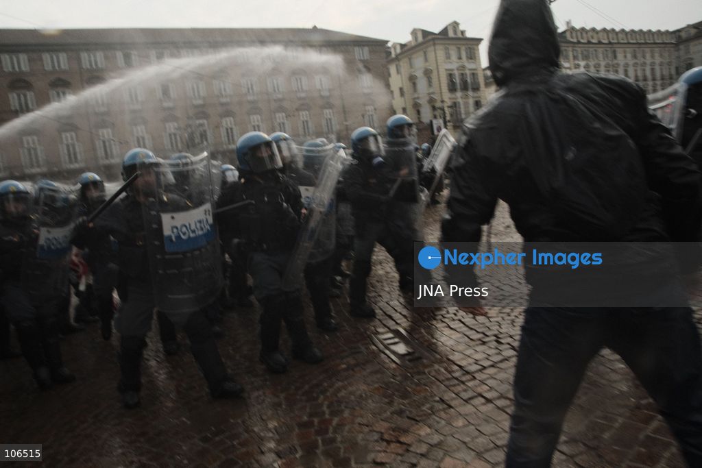 TURIN, ITALY, OCTOBER 16, 2026: Students demonstrate against deteriorating school buildings, insufficient education funding and job insecurity, calling for greater investment in education rather than military spending. Clashes break out in Piazza Castello, where police use water cannons and charge demonstrators. Earlier along the route, teachers link arms between students and police to prevent confrontation. Photo by Julian Nelaj / JNA Press. (Photo by Julian Nelaj/JNA Press via Nexpher Images)
