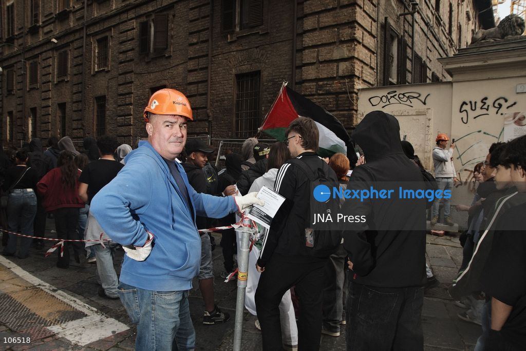 TURIN, ITALY, OCTOBER 16, 2026: Students demonstrate against deteriorating school buildings, insufficient education funding and job insecurity, calling for greater investment in education rather than military spending. Clashes break out in Piazza Castello, where police use water cannons and charge demonstrators. Earlier along the route, teachers link arms between students and police to prevent confrontation. Photo by Julian Nelaj / JNA Press. (Photo by Julian Nelaj/JNA Press via Nexpher Images)