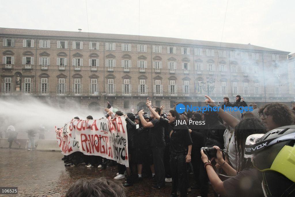 TURIN, ITALY, OCTOBER 16, 2026: Students demonstrate against deteriorating school buildings, insufficient education funding and job insecurity, calling for greater investment in education rather than military spending. Clashes break out in Piazza Castello, where police use water cannons and charge demonstrators. Earlier along the route, teachers link arms between students and police to prevent confrontation. Photo by Julian Nelaj / JNA Press. (Photo by Julian Nelaj/JNA Press via Nexpher Images)