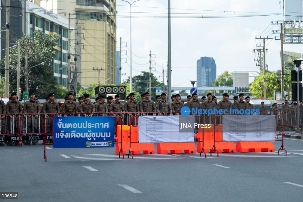 BANGKOK, THAILAND, OCTOBER 16, 2026: Police stand behind barriers near the Queen Sirikit National Convention Center during the annual meetings of the International Monetary Fund (IMF) and the World Bank Group. Authorities deploy crowd-control officers and restrict road access as members of the Assembly of the Poor and allied networks march towards the venue to demand economic justice. Photo by Thanatchanont Jiraworathanakul / JNA Press. (Photo by Thanatchanont Jiraworathanakul/JNA Press via Nexpher Images)