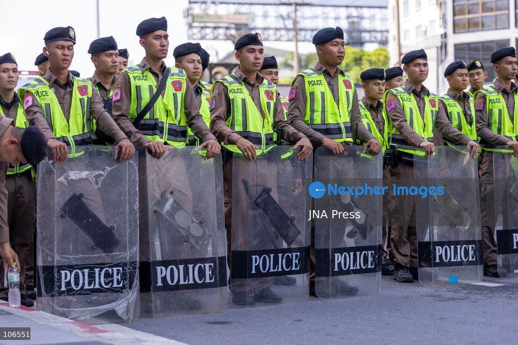 BANGKOK, THAILAND, OCTOBER 16, 2026: Police stand behind barriers near the Queen Sirikit National Convention Center during the annual meetings of the International Monetary Fund (IMF) and the World Bank Group. Authorities deploy crowd-control officers and restrict road access as members of the Assembly of the Poor and allied networks march towards the venue to demand economic justice. Photo by Thanatchanont Jiraworathanakul / JNA Press. (Photo by Thanatchanont Jiraworathanakul/JNA Press via Nexpher Images)