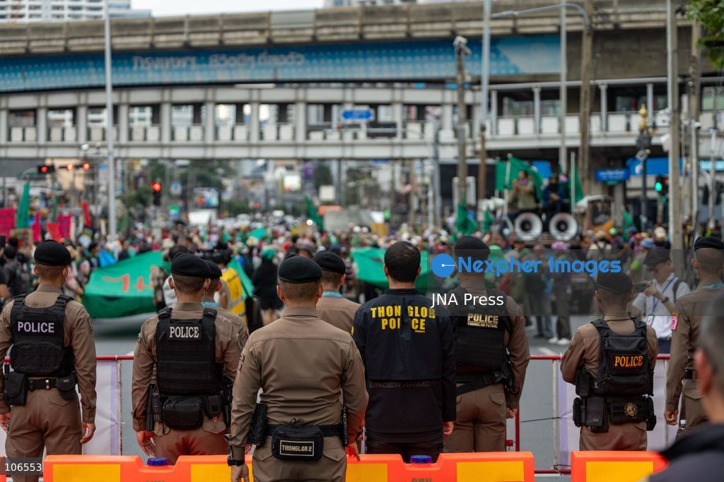 BANGKOK, THAILAND, OCTOBER 16, 2026: Police stand behind barriers near the Queen Sirikit National Convention Center during the annual meetings of the International Monetary Fund (IMF) and the World Bank Group. Authorities deploy crowd-control officers and restrict road access as members of the Assembly of the Poor and allied networks march towards the venue to demand economic justice. Photo by Thanatchanont Jiraworathanakul / JNA Press. (Photo by Thanatchanont Jiraworathanakul/JNA Press via Nexpher Images)