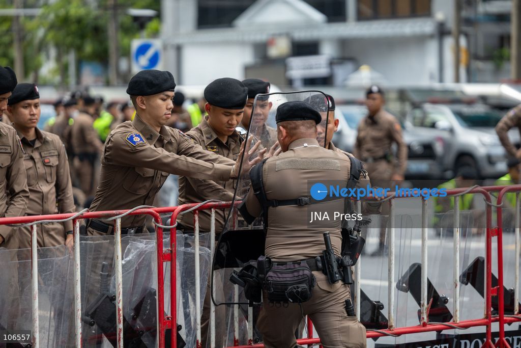 BANGKOK, THAILAND, OCTOBER 16, 2026: Police stand behind barriers near the Queen Sirikit National Convention Center during the annual meetings of the International Monetary Fund (IMF) and the World Bank Group. Authorities deploy crowd-control officers and restrict road access as members of the Assembly of the Poor and allied networks march towards the venue to demand economic justice. Photo by Thanatchanont Jiraworathanakul / JNA Press. (Photo by Thanatchanont Jiraworathanakul/JNA Press via Nexpher Images)