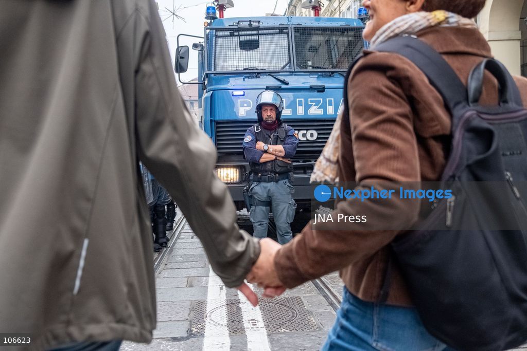 TURIN, ITALY, OCTOBER 16, 2026: Students demonstrate for improved school conditions and greater education funding following a wave of school occupations. Clashes erupt in Piazza Castello, where some demonstrators throw stones and police use water cannons, tear gas and baton charges. Teachers form human chains between students and officers during confrontations. The march ends at Palazzo Nuovo, part of the University of Turin. Photo by Camilla Baronetto / JNA Press. (Photo by Camilla Baronetto/JNA Press via Nexpher Images)