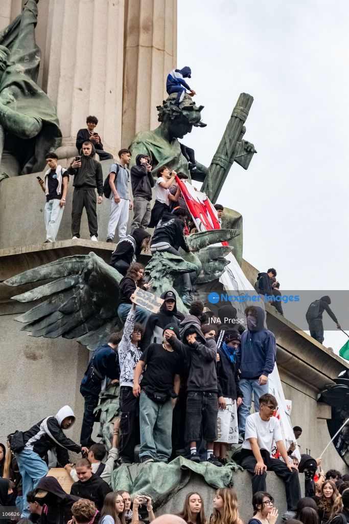 TURIN, ITALY, OCTOBER 16, 2026: Students demonstrate for improved school conditions and greater education funding following a wave of school occupations. Clashes erupt in Piazza Castello, where some demonstrators throw stones and police use water cannons, tear gas and baton charges. Teachers form human chains between students and officers during confrontations. The march ends at Palazzo Nuovo, part of the University of Turin. Photo by Camilla Baronetto / JNA Press. (Photo by Camilla Baronetto/JNA Press via Nexpher Images)