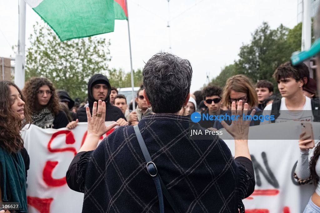 TURIN, ITALY, OCTOBER 16, 2026: Students demonstrate for improved school conditions and greater education funding following a wave of school occupations. Clashes erupt in Piazza Castello, where some demonstrators throw stones and police use water cannons, tear gas and baton charges. Teachers form human chains between students and officers during confrontations. The march ends at Palazzo Nuovo, part of the University of Turin. Photo by Camilla Baronetto / JNA Press. (Photo by Camilla Baronetto/JNA Press via Nexpher Images)