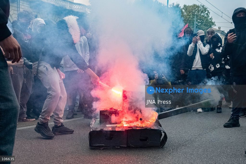 TURIN, ITALY, OCTOBER 16, 2026: Students demonstrate for improved school conditions and greater education funding following a wave of school occupations. Clashes erupt in Piazza Castello, where some demonstrators throw stones and police use water cannons, tear gas and baton charges. Teachers form human chains between students and officers during confrontations. The march ends at Palazzo Nuovo, part of the University of Turin. Photo by Camilla Baronetto / JNA Press. (Photo by Camilla Baronetto/JNA Press via Nexpher Images)