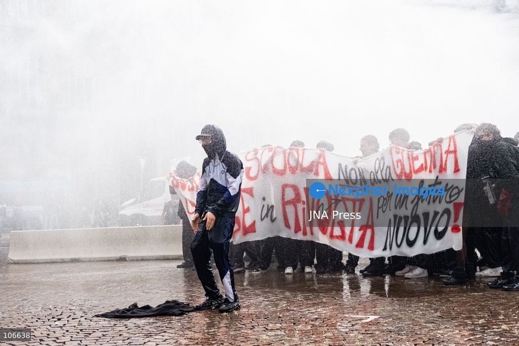 TURIN, ITALY, OCTOBER 16, 2026: Students demonstrate for improved school conditions and greater education funding following a wave of school occupations. Clashes erupt in Piazza Castello, where some demonstrators throw stones and police use water cannons, tear gas and baton charges. Teachers form human chains between students and officers during confrontations. The march ends at Palazzo Nuovo, part of the University of Turin. Photo by Camilla Baronetto / JNA Press. (Photo by Camilla Baronetto/JNA Press via Nexpher Images)