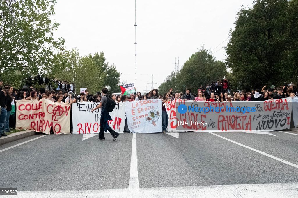 TURIN, ITALY, OCTOBER 16, 2026: Students demonstrate for improved school conditions and greater education funding following a wave of school occupations. Clashes erupt in Piazza Castello, where some demonstrators throw stones and police use water cannons, tear gas and baton charges. Teachers form human chains between students and officers during confrontations. The march ends at Palazzo Nuovo, part of the University of Turin. Photo by Camilla Baronetto / JNA Press. (Photo by Camilla Baronetto/JNA Press via Nexpher Images)