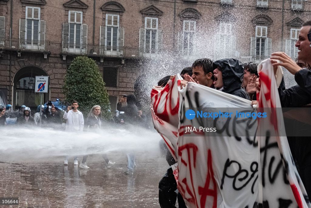 TURIN, ITALY, OCTOBER 16, 2026: Students demonstrate for improved school conditions and greater education funding following a wave of school occupations. Clashes erupt in Piazza Castello, where some demonstrators throw stones and police use water cannons, tear gas and baton charges. Teachers form human chains between students and officers during confrontations. The march ends at Palazzo Nuovo, part of the University of Turin. Photo by Camilla Baronetto / JNA Press. (Photo by Camilla Baronetto/JNA Press via Nexpher Images)