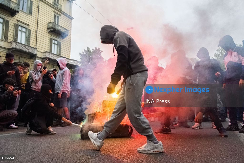 TURIN, ITALY, OCTOBER 16, 2026: Students demonstrate for improved school conditions and greater education funding following a wave of school occupations. Clashes erupt in Piazza Castello, where some demonstrators throw stones and police use water cannons, tear gas and baton charges. Teachers form human chains between students and officers during confrontations. The march ends at Palazzo Nuovo, part of the University of Turin. Photo by Camilla Baronetto / JNA Press. (Photo by Camilla Baronetto/JNA Press via Nexpher Images)