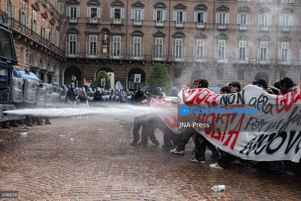 TURIN, ITALY, OCTOBER 16, 2026: Students demonstrate for improved school conditions and greater education funding following a wave of school occupations. Clashes erupt in Piazza Castello, where some demonstrators throw stones and police use water cannons, tear gas and baton charges. Teachers form human chains between students and officers during confrontations. The march ends at Palazzo Nuovo, part of the University of Turin. Photo by Camilla Baronetto / JNA Press. (Photo by Camilla Baronetto/JNA Press via Nexpher Images)