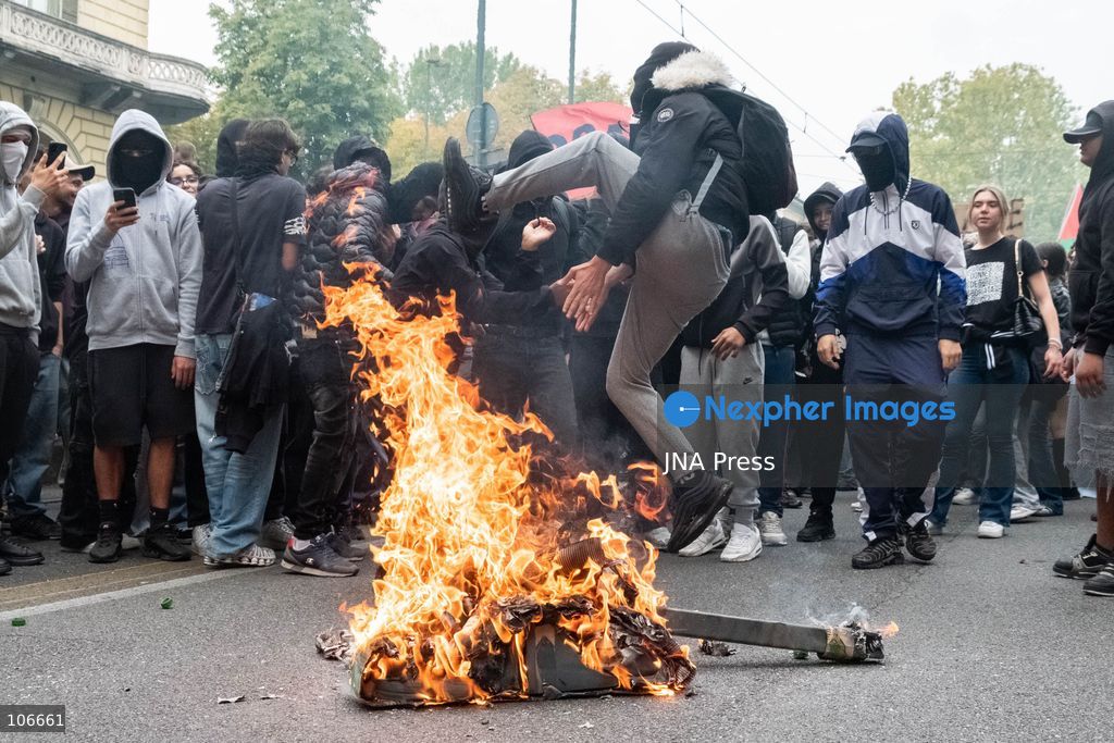 TURIN, ITALY, OCTOBER 16, 2026: Students demonstrate for improved school conditions and greater education funding following a wave of school occupations. Clashes erupt in Piazza Castello, where some demonstrators throw stones and police use water cannons, tear gas and baton charges. Teachers form human chains between students and officers during confrontations. The march ends at Palazzo Nuovo, part of the University of Turin. Photo by Camilla Baronetto / JNA Press. (Photo by Camilla Baronetto/JNA Press via Nexpher Images)