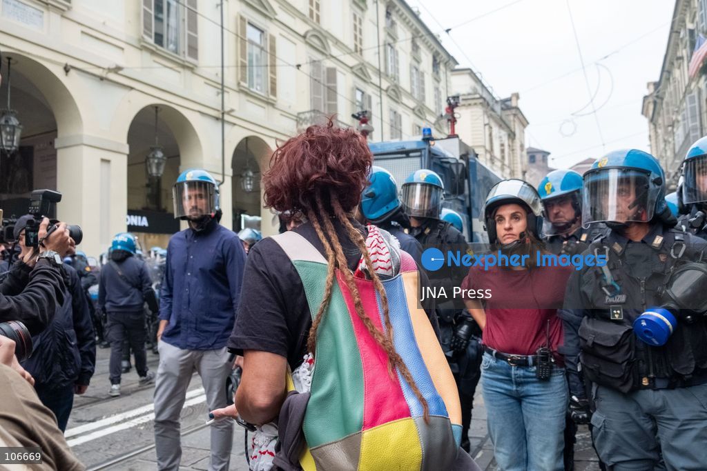TURIN, ITALY, OCTOBER 16, 2026: Students demonstrate for improved school conditions and greater education funding following a wave of school occupations. Clashes erupt in Piazza Castello, where some demonstrators throw stones and police use water cannons, tear gas and baton charges. Teachers form human chains between students and officers during confrontations. The march ends at Palazzo Nuovo, part of the University of Turin. Photo by Camilla Baronetto / JNA Press. (Photo by Camilla Baronetto/JNA Press via Nexpher Images)