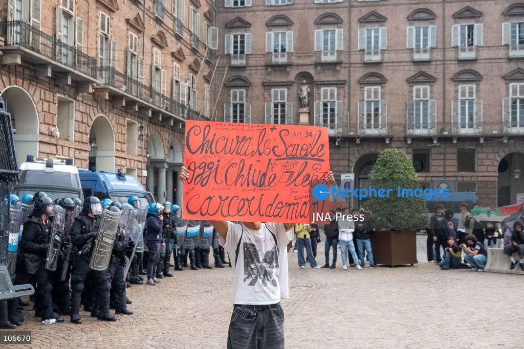 TURIN, ITALY, OCTOBER 16, 2026: Students demonstrate for improved school conditions and greater education funding following a wave of school occupations. Clashes erupt in Piazza Castello, where some demonstrators throw stones and police use water cannons, tear gas and baton charges. Teachers form human chains between students and officers during confrontations. The march ends at Palazzo Nuovo, part of the University of Turin. Photo by Camilla Baronetto / JNA Press. (Photo by Camilla Baronetto/JNA Press via Nexpher Images)