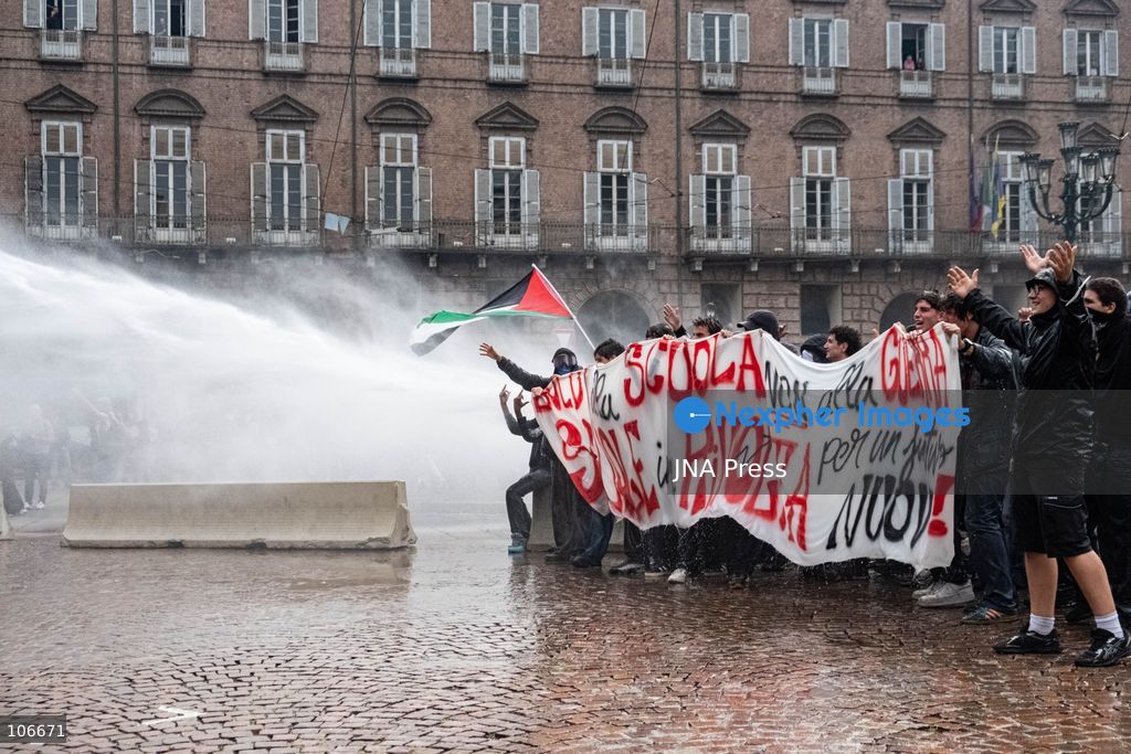 TURIN, ITALY, OCTOBER 16, 2026: Students demonstrate for improved school conditions and greater education funding following a wave of school occupations. Clashes erupt in Piazza Castello, where some demonstrators throw stones and police use water cannons, tear gas and baton charges. Teachers form human chains between students and officers during confrontations. The march ends at Palazzo Nuovo, part of the University of Turin. Photo by Camilla Baronetto / JNA Press. (Photo by Camilla Baronetto/JNA Press via Nexpher Images)