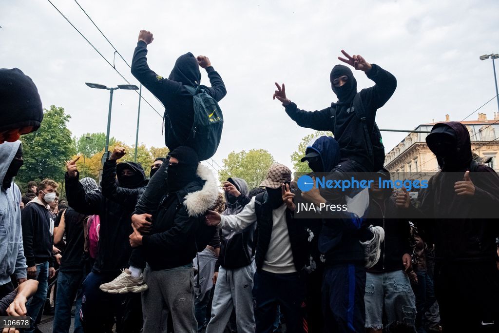 TURIN, ITALY, OCTOBER 16, 2026: Students demonstrate for improved school conditions and greater education funding following a wave of school occupations. Clashes erupt in Piazza Castello, where some demonstrators throw stones and police use water cannons, tear gas and baton charges. Teachers form human chains between students and officers during confrontations. The march ends at Palazzo Nuovo, part of the University of Turin. Photo by Camilla Baronetto / JNA Press. (Photo by Camilla Baronetto/JNA Press via Nexpher Images)