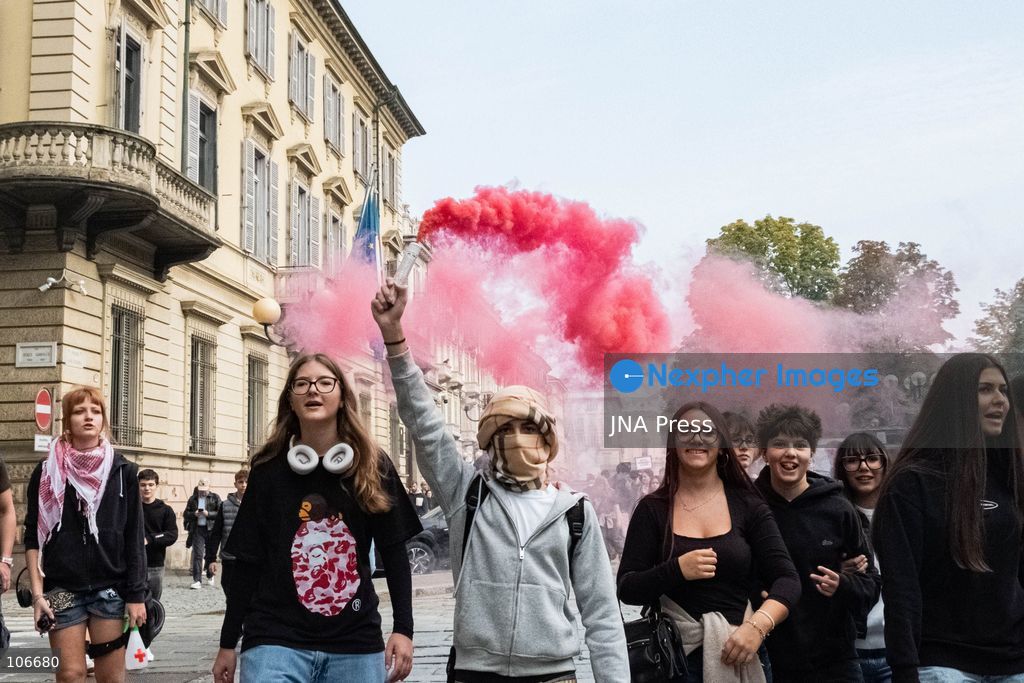 TURIN, ITALY, OCTOBER 16, 2026: Students demonstrate for improved school conditions and greater education funding following a wave of school occupations. Clashes erupt in Piazza Castello, where some demonstrators throw stones and police use water cannons, tear gas and baton charges. Teachers form human chains between students and officers during confrontations. The march ends at Palazzo Nuovo, part of the University of Turin. Photo by Camilla Baronetto / JNA Press. (Photo by Camilla Baronetto/JNA Press via Nexpher Images)
