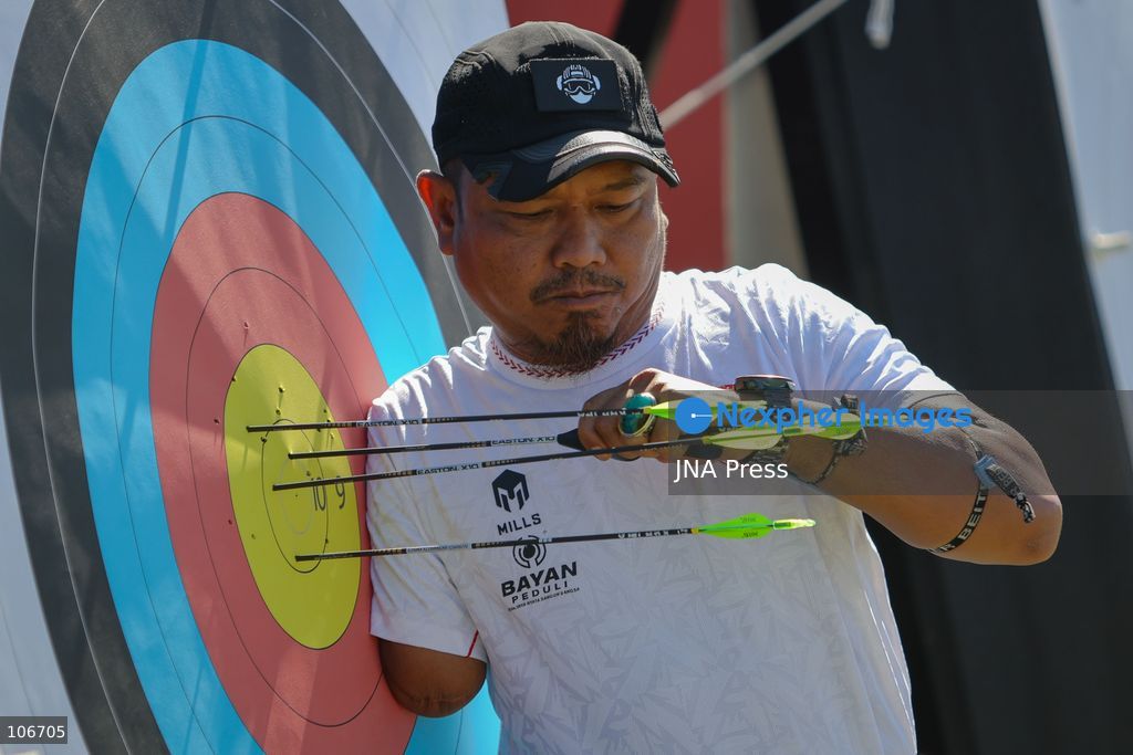 OKAZAKI, JAPAN — OCTOBER 15, 2026: Indonesian para archer Kholidin removes an arrow during an official training session for the 5th Asian Para Games Aichi-Nagoya 2026 at Okazaki Chuo Sogo Park, Japan, Thursday, October 15, 2026. The Indonesian team is targeting two final berths across the nine events it is competing in. Photo by Dwi Prasetya/JNA Press. (Photo by Dwi Prasetya/JNA Press via Nexpher Images)