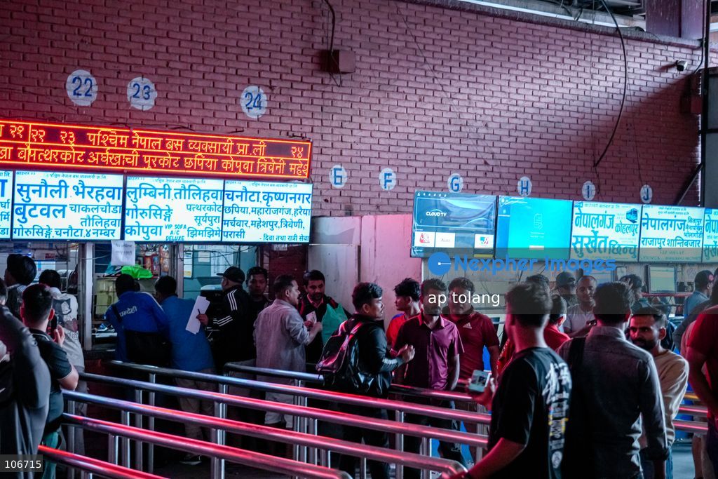 Kathmandu, NEPAL, October 16, 2026: Passengers crowd a bus terminal as they prepare to return to their hometowns and villages for the Dashain festival in Kathmandu, Nepal. Thousands of people leave the capital to celebrate the festival with their families, receive blessings from elders, and participate in traditional rituals. Dashain is one of Nepal’s biggest and most widely celebrated festivals. (Photo by ap tolang/Nexpher Images)