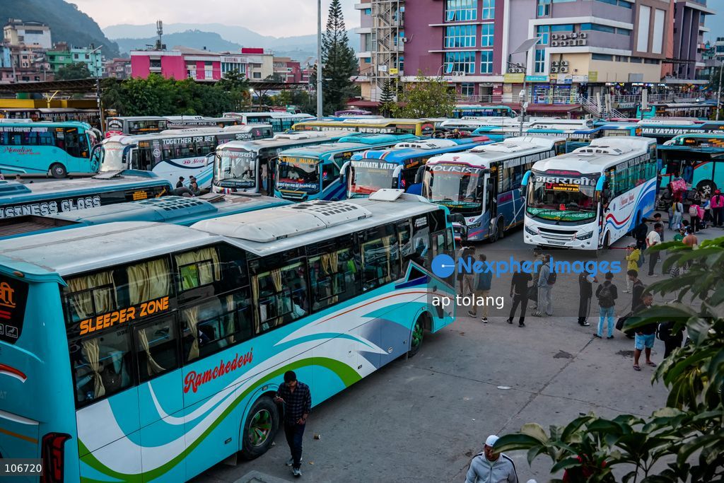 Kathmandu, NEPAL, October 16, 2026: Passengers crowd a bus terminal as they prepare to return to their hometowns and villages for the Dashain festival in Kathmandu, Nepal. Thousands of people leave the capital to celebrate the festival with their families, receive blessings from elders, and participate in traditional rituals. Dashain is one of Nepal’s biggest and most widely celebrated festivals. (Photo by ap tolang/Nexpher Images)