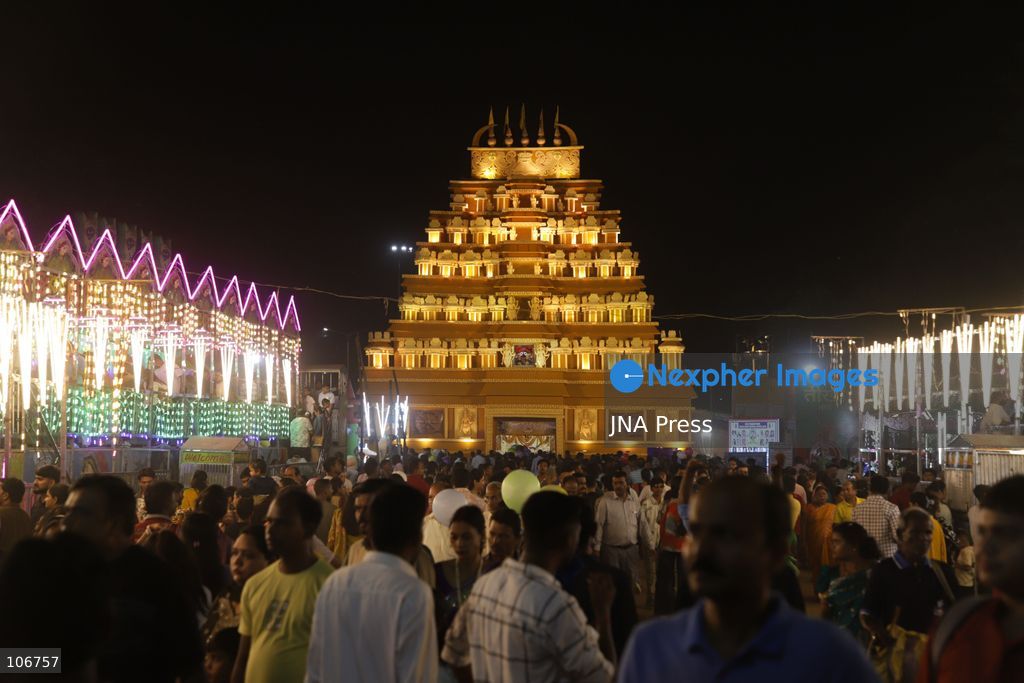 JAMSHEDPUR, JHARKHAND, INDIA, OCTOBER 16, 2026: Devotees visit a decorated pandal, a temporary worship pavilion, during Durga Puja celebrations in Jamshedpur. The Hindu festival honours Goddess Durga and celebrates the victory of good over evil. Photo by Rohit Kumar Shaw / JNA Press. (Photo by Rohit Kumar Shaw/JNA Press via Nexpher Images)