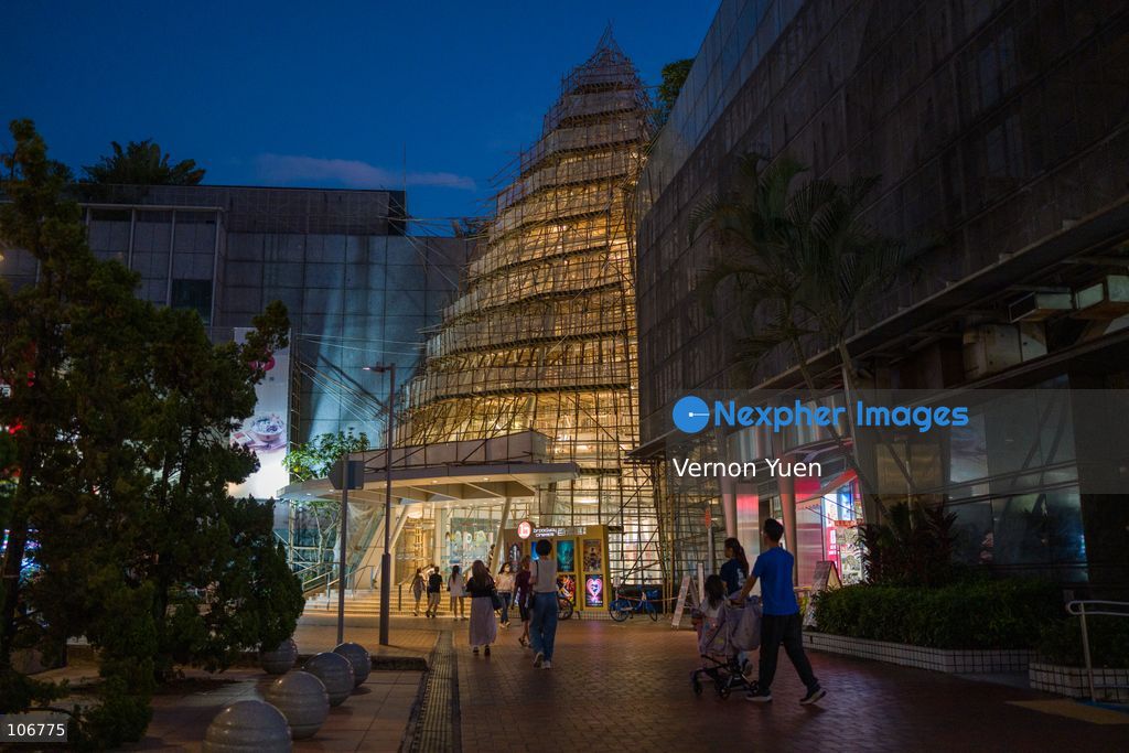 Bamboo scaffolding at an entrance of a shopping center on October 17, 2026 in Hong Kong. (Photo by Vernon Yuen/Nexpher Images)
