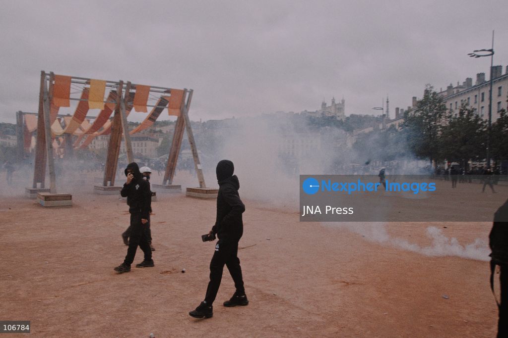 LYON, FRANCE, OCTOBER 17, 2026: Demonstrators clash with police at Place Bellecour in Lyon during nationwide protests against the high cost of living. Police use tear gas and a water cannon during the confrontations. A tourist information office on the square is ransacked and set on fire during the unrest. Photo by Julian Nelaj / JNA Press. (Photo by Julian Nelaj/JNA Press via Nexpher Images)